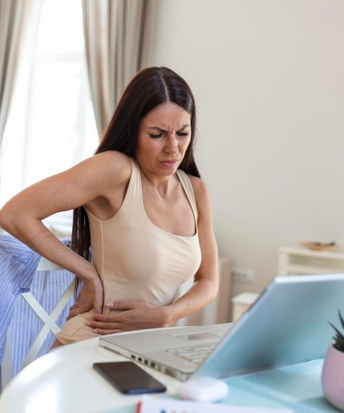 Woman suffering pain from Pelvic Floor Disorders